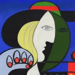 Portret kobiety w stylu kubistycznym, z charakterystycznym podziałem twarzy i geometrycznymi kształtami.